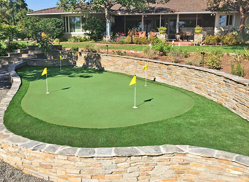 Artificial turf putting green